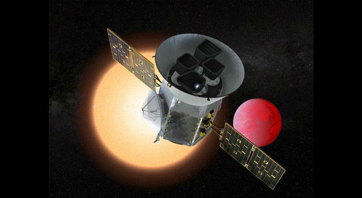 Ilustração artística da TESS em frente de um planeta da lava que orbita sua estrela. Crédito da imagem: Goddard Space Flight Center da NASA