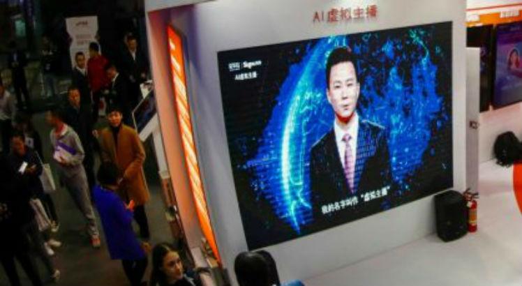 Dupla de hologramas apresentou noticiário na China | Foto: AFP