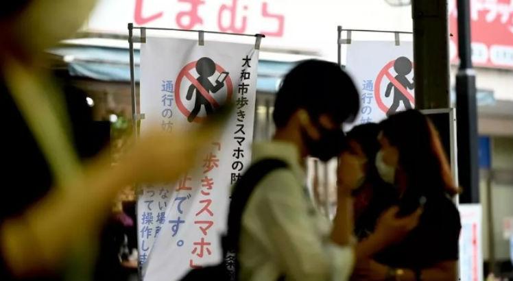 Cartaz sobre a proibição em Yamato. Foto: AFP