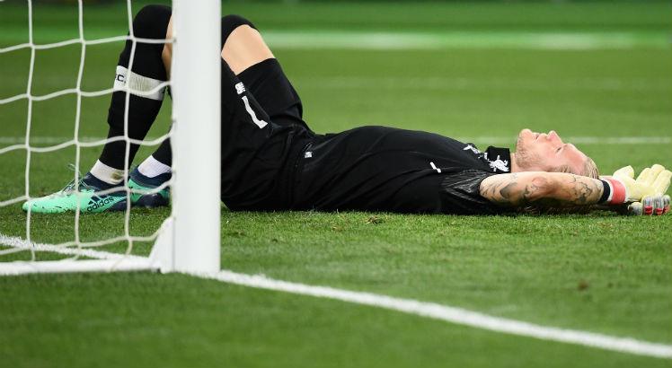 Karius falhou logo após levar uma cotovelada na cabeça do zagueiro Sergio Ramos. Foto: FRANCK FIFE/AFP