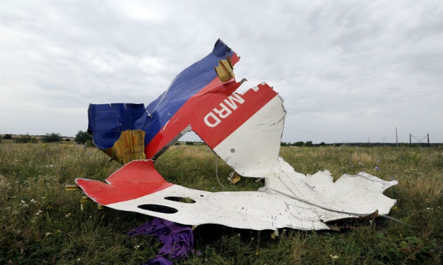 Autoridades ucranianas e ocidentais disseram que possuem evidências que  apontam os rebeldes pró-Rússia como responsáveis pela queda do avião da Malaysia Airlines / Foto: Dominique Faget / AFP