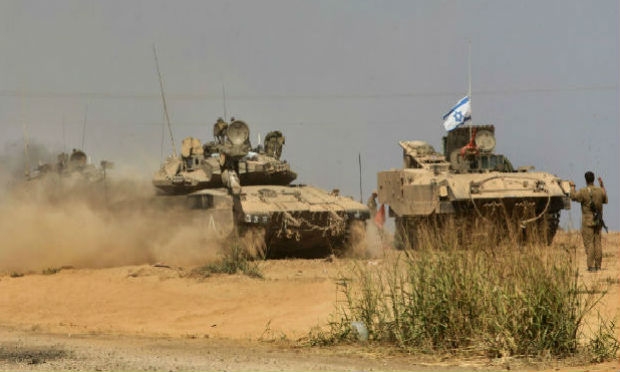 Soldados israelenses continuam na fronteira de Gaza / Foto: AFP