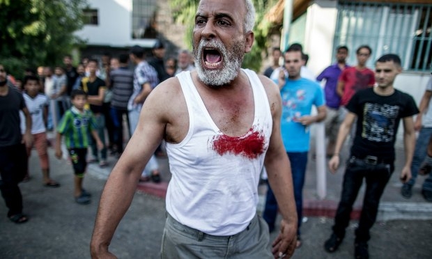 Desde o início da ofensiva de Israel, há 22 dias, os bombardeios contra a Faixa de Gaza já mataram 1.099 palestinos / Foto: Marco Longari / AFP